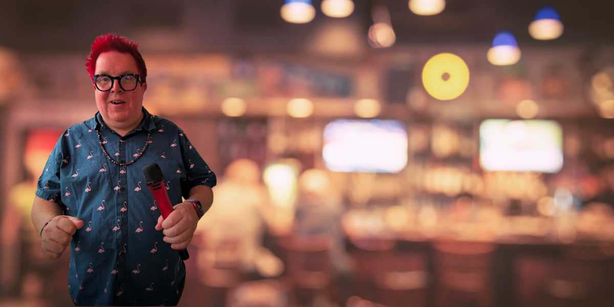 Mr Krys hosting quiz night event - DotAltEvents founder and professional entertainment host with red hair at Birmingham venue